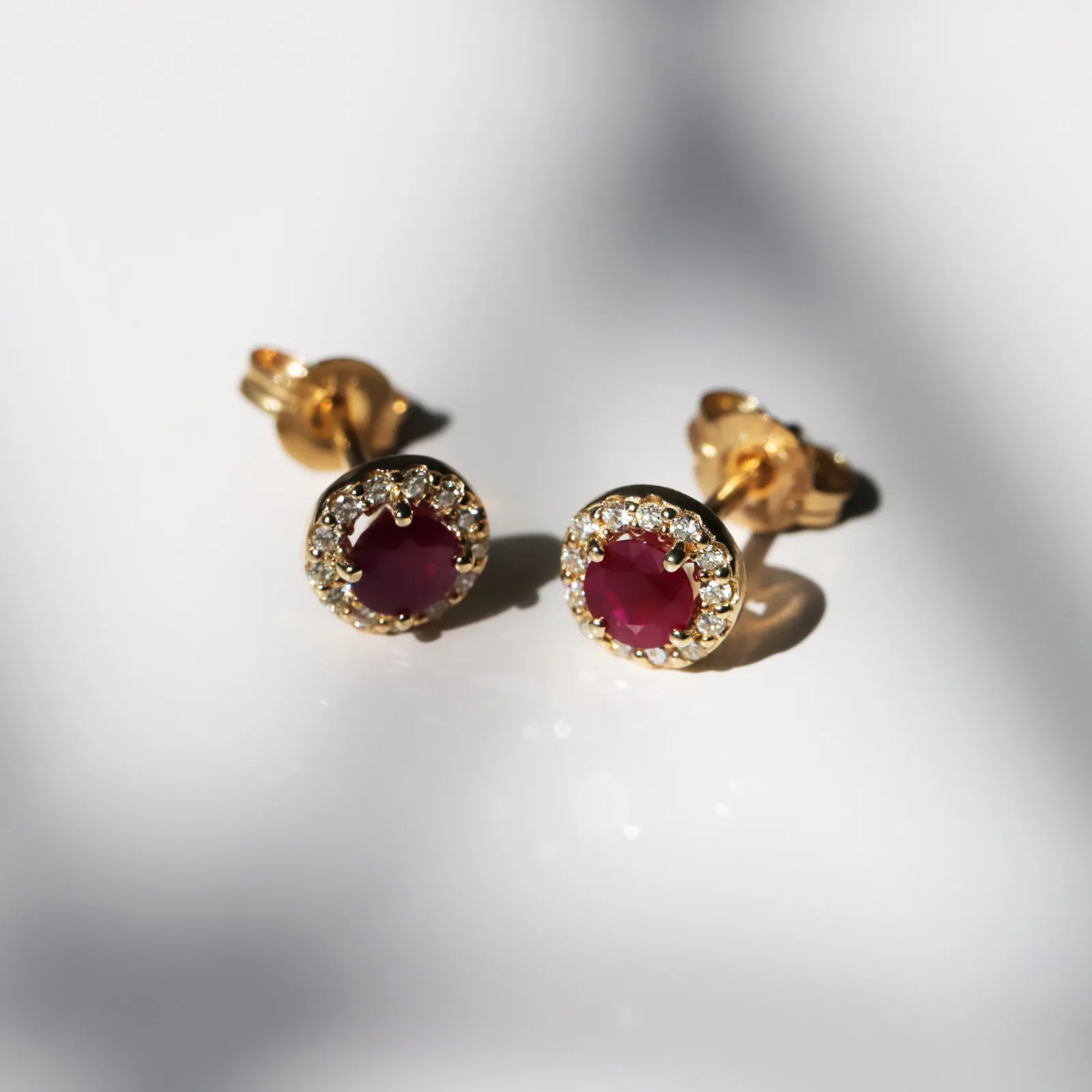 9ct Yellow Gold Ruby Stud Earrings With Diamond Halo