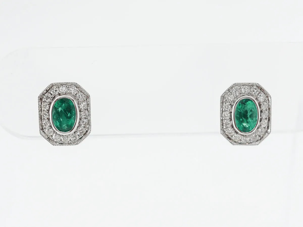 Emerald & Diamond Halo Earrings in 14k White Gold