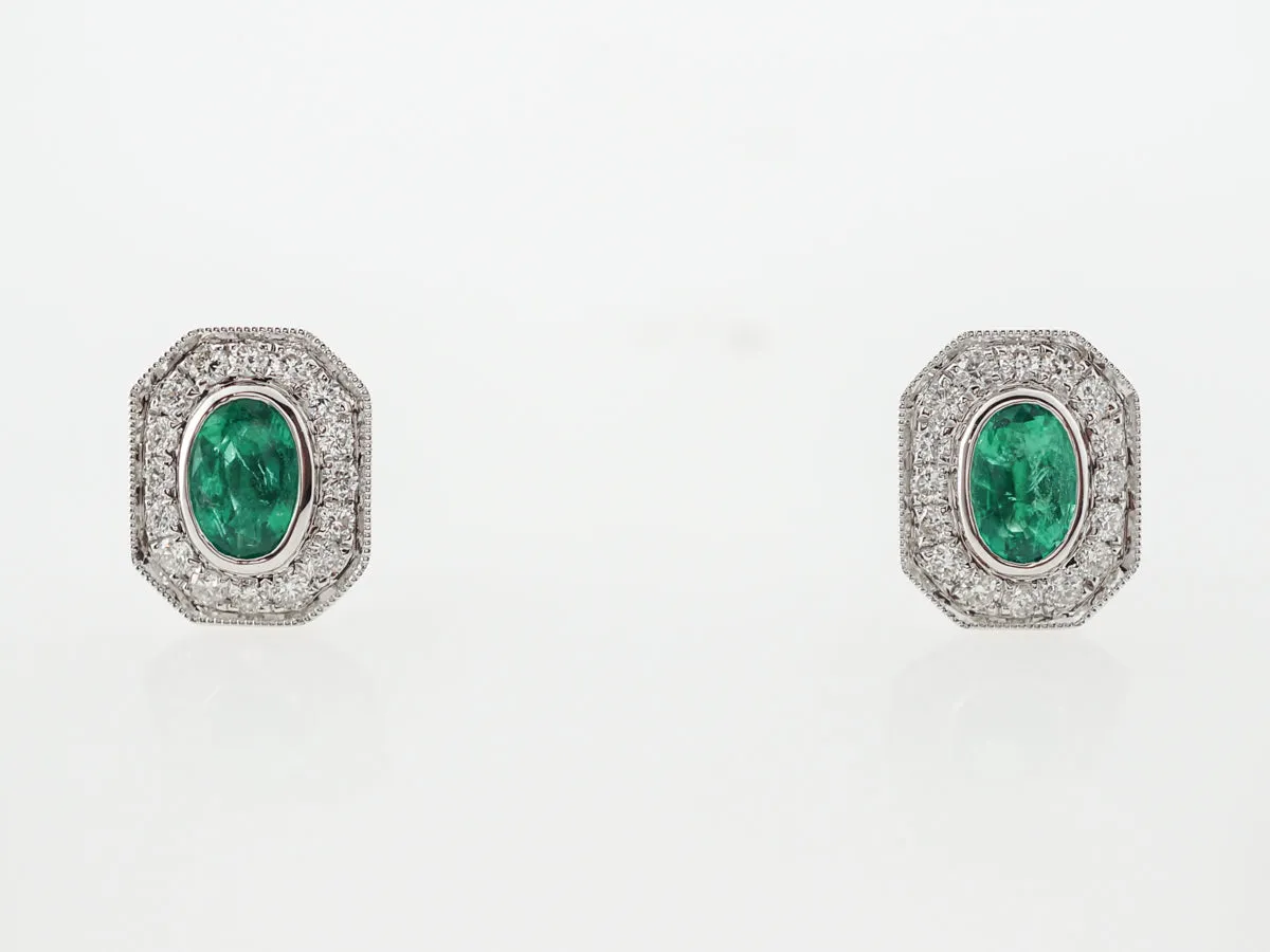 Emerald & Diamond Halo Earrings in 14k White Gold