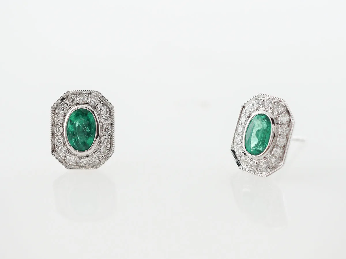 Emerald & Diamond Halo Earrings in 14k White Gold