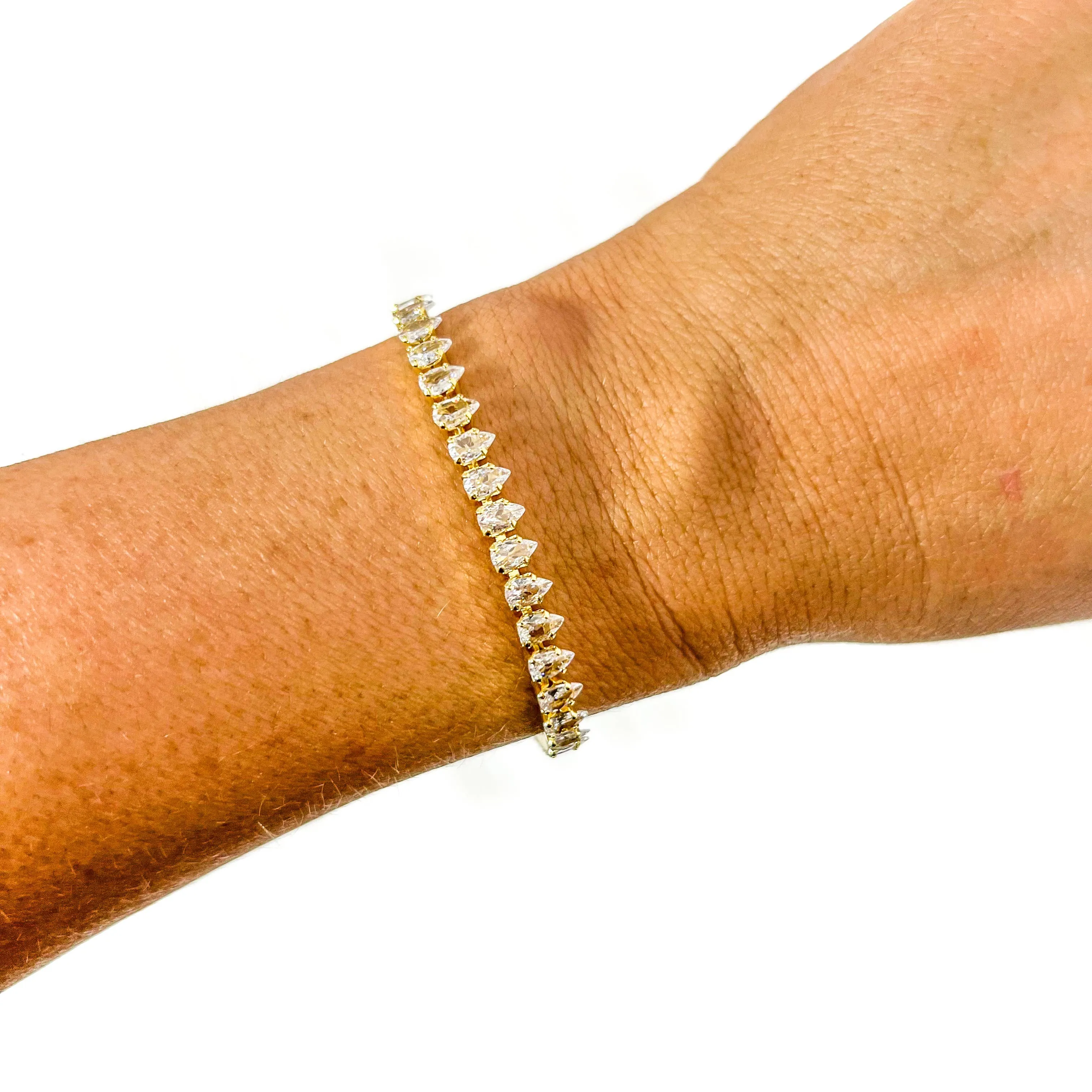 Gold Bracelet, Pear, baguette and more