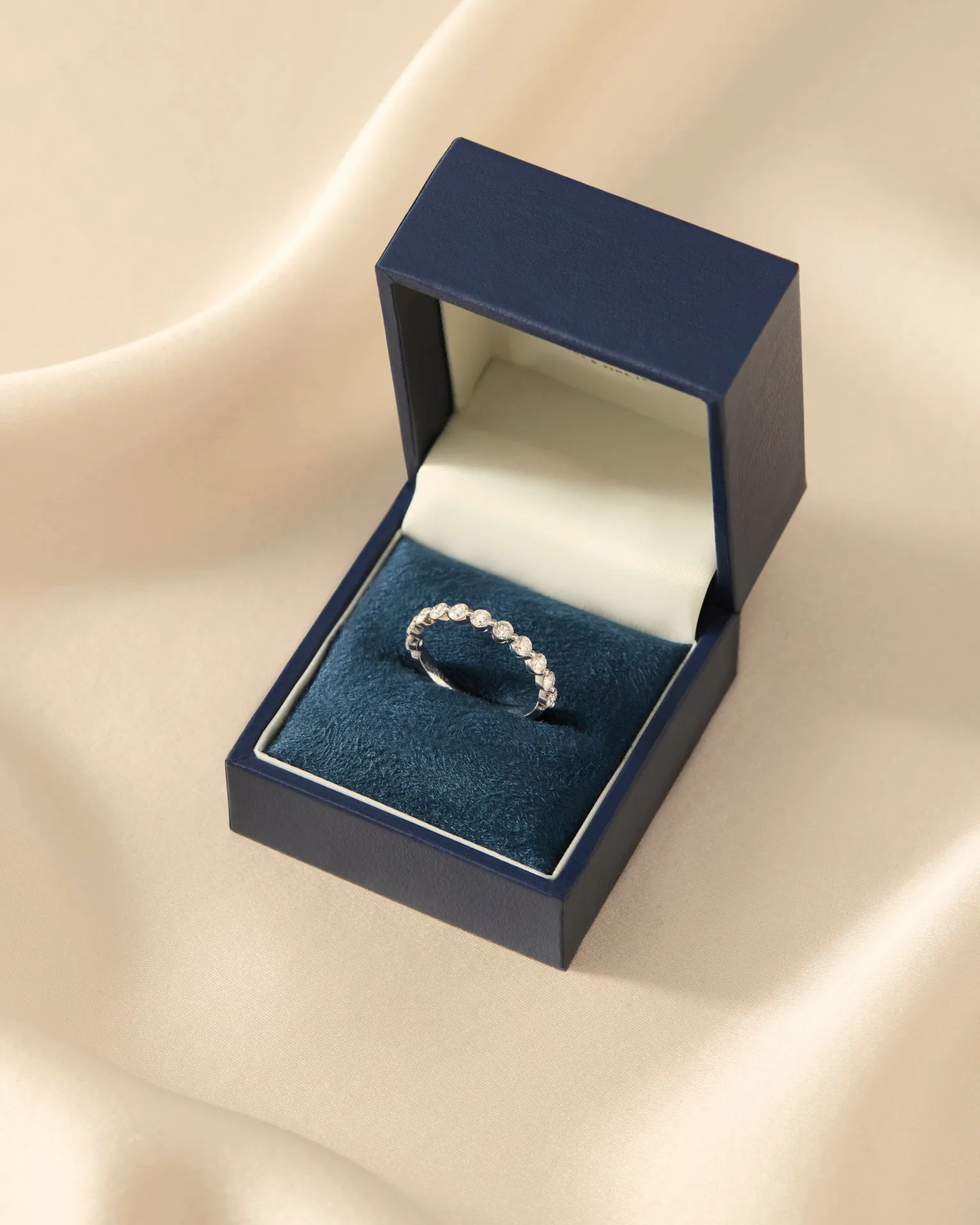 Vera | Floating 11 Stone Round Diamond Ring